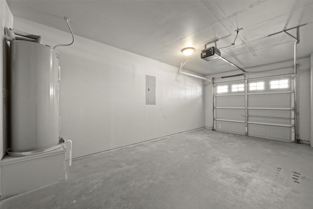 garage featuring a garage door opener and electric panel