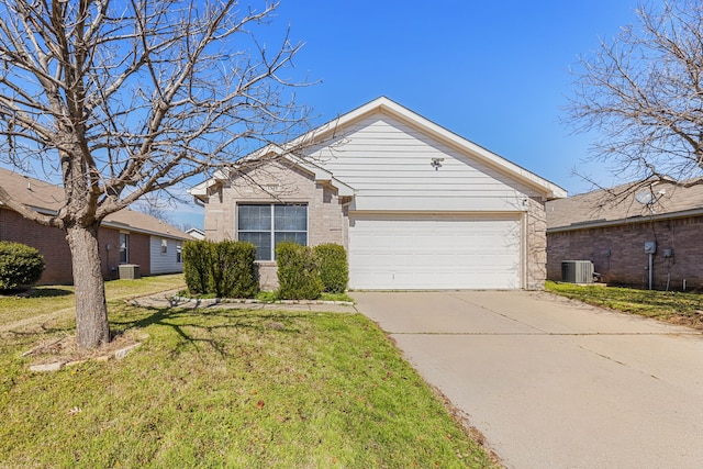 single story home with central air condition unit, a front lawn, and a garage