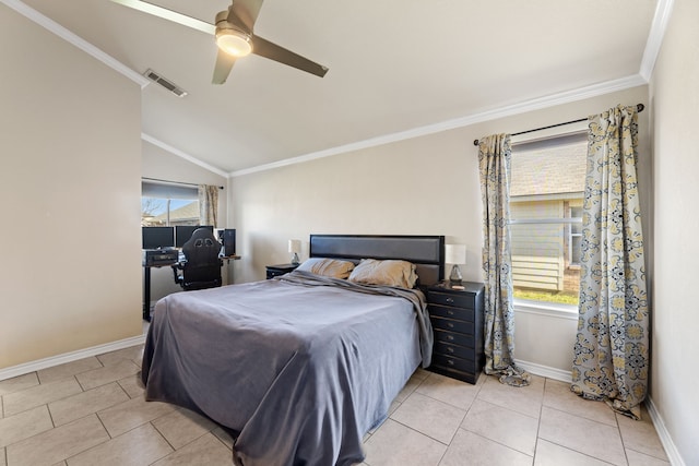 tiled bedroom featuring lofted ceiling, ceiling fan, and ornamental molding