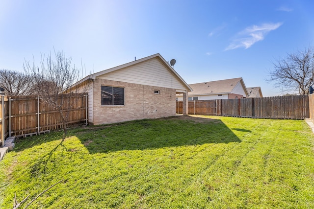 back of house featuring a yard