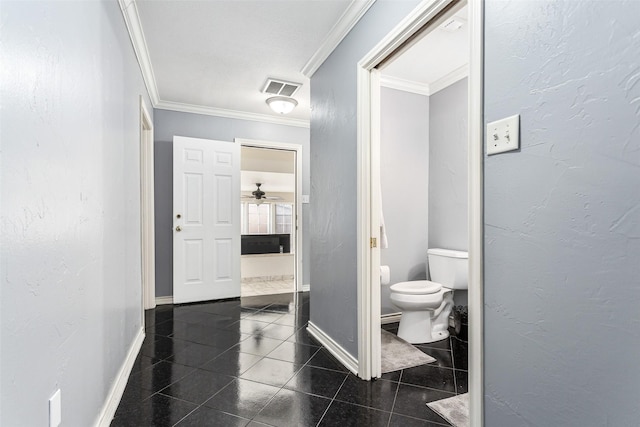 bathroom featuring toilet, tile patterned flooring, crown molding, and ceiling fan