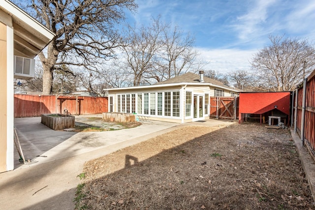 back of house featuring a patio area