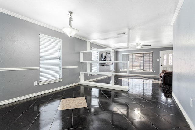 dining area with crown molding and ceiling fan