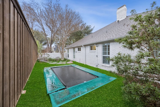 exterior space featuring a trampoline