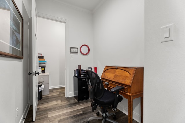 office space featuring baseboards, ornamental molding, and dark wood-type flooring