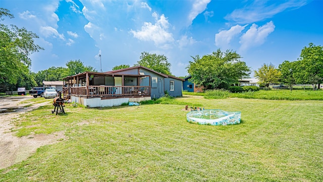 back of house with a lawn