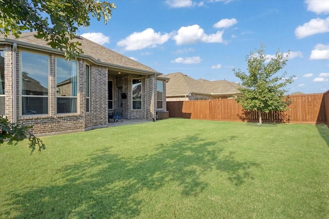 4024 Rosin St, Aubrey, TX 76227 - view of yard with a fenced backyard and a patio area