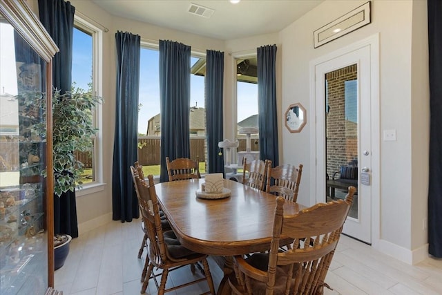 4024 Rosin St, Aubrey, TX 76227 - dining room with baseboards, visible vents, and plenty of natural light