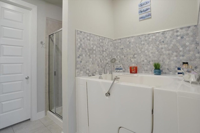 4024 Rosin St, Aubrey, TX 76227 - full bath featuring tile patterned floors, a garden tub, and a stall shower