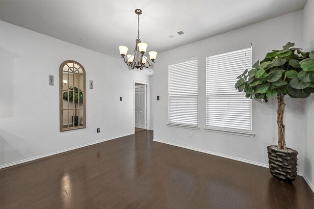 4424 Dashland Dr, Celina, TX 75009 - spare room featuring dark hardwood / wood-style flooring and an inviting chandelier
