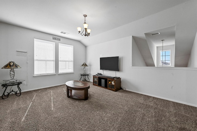 4424 Dashland Dr, Celina, TX 75009 - living room with dark carpet, a healthy amount of sunlight, an inviting chandelier, and vaulted ceiling