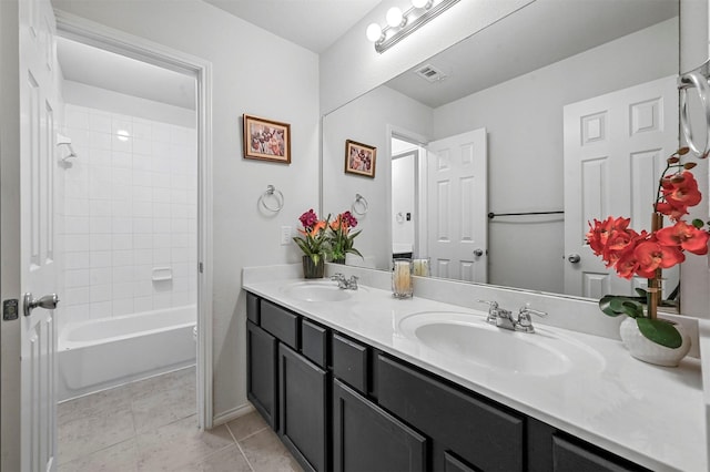 4424 Dashland Dr, Celina, TX 75009 - bathroom with vanity, tiled shower / bath, and tile patterned floors