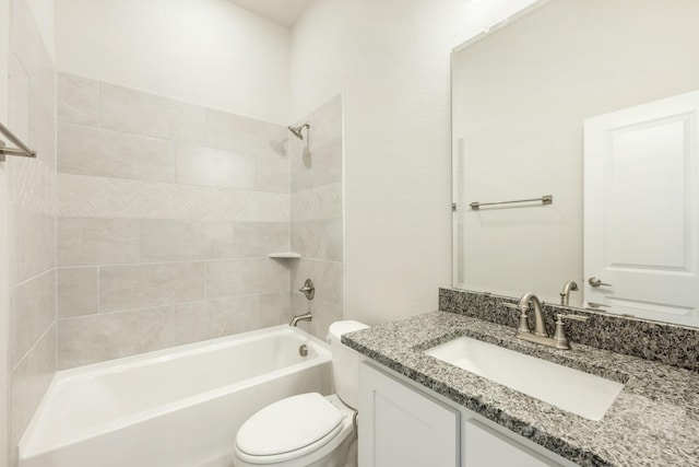 full bath featuring toilet, vanity, and shower / bathing tub combination