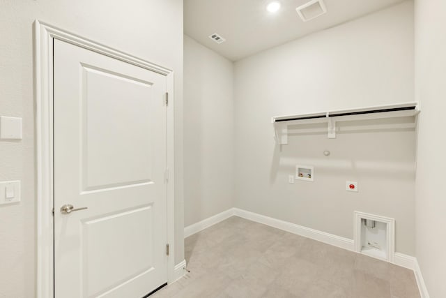 clothes washing area featuring laundry area, visible vents, washer hookup, hookup for an electric dryer, and gas dryer hookup