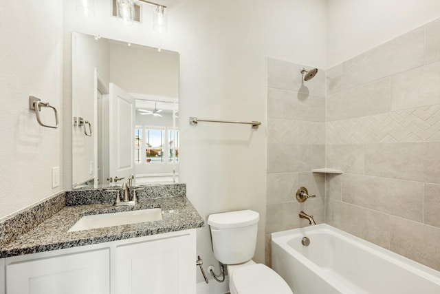 full bathroom with toilet, vanity, tub / shower combination, and ceiling fan