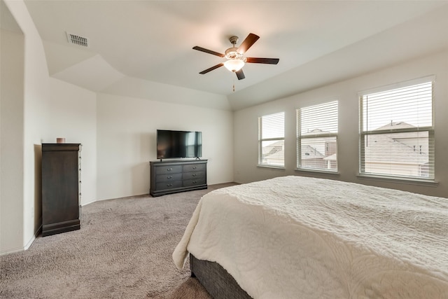 bedroom with ceiling fan and light carpet