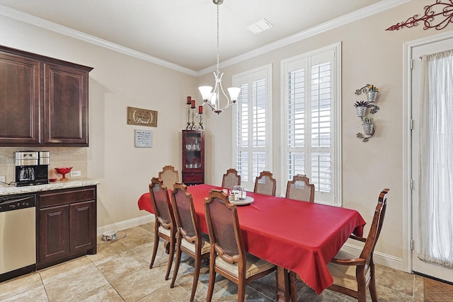 dining space featuring a chandelier, light tile patterned floors, visible vents, baseboards, and ornamental molding