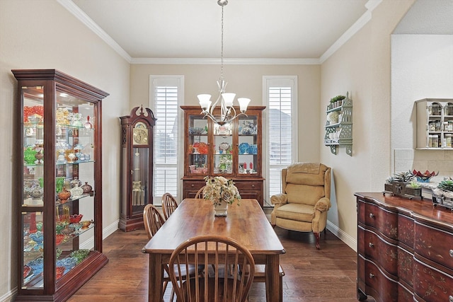 dining space with a healthy amount of sunlight, a chandelier, and dark wood finished floors