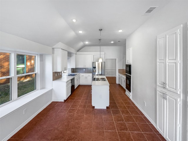 kitchen with a sink, white cabinetry, a center island, black appliances, and pendant lighting