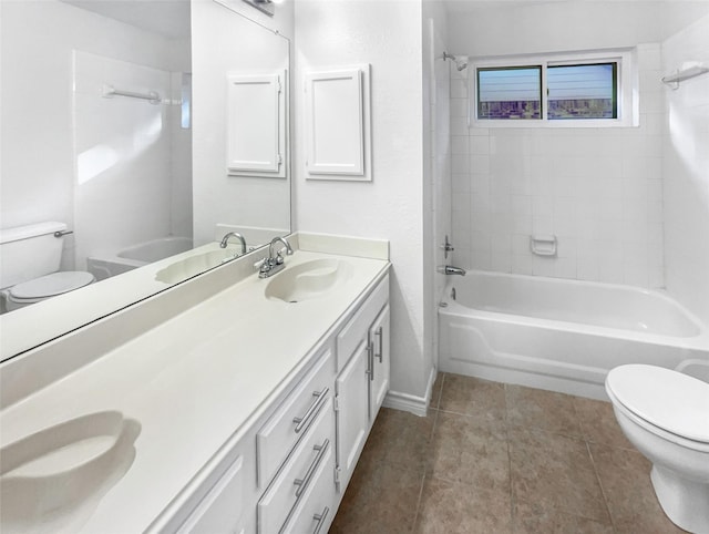 bathroom with tub / shower combination, a sink, toilet, and double vanity