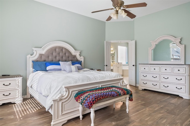 bedroom featuring ceiling fan, dark wood finished floors, and connected bathroom