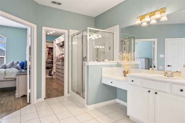 walk in closet featuring wood tiled floor