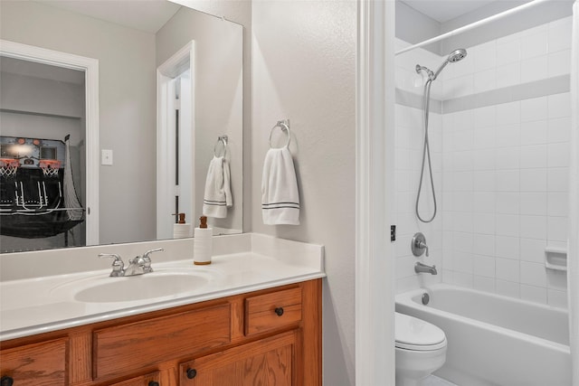 full bathroom featuring shower / washtub combination, vanity, and toilet