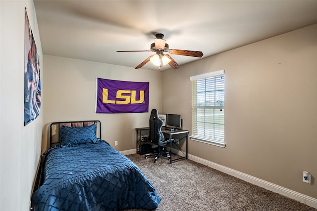 bedroom featuring ceiling fan and carpet floors