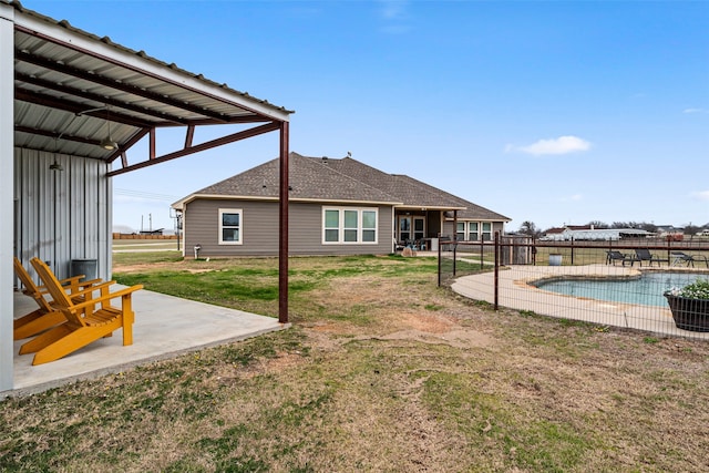 view of yard with a patio and a fenced in pool