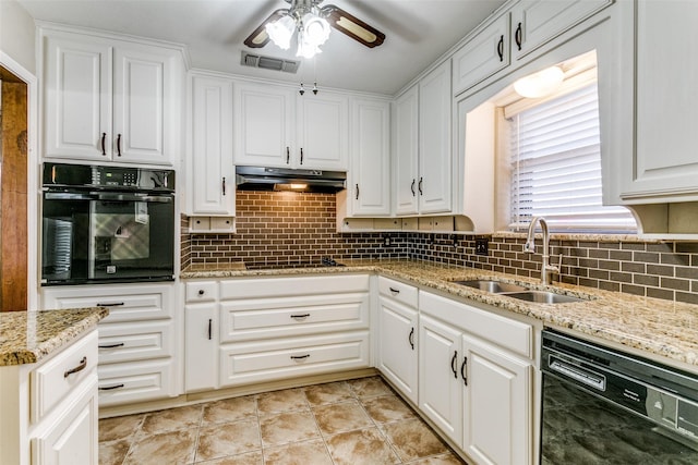 kitchen featuring sink, black appliances, and white cabinets