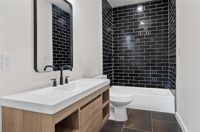 full bathroom with tiled shower / bath combo, vanity, tile patterned flooring, and toilet