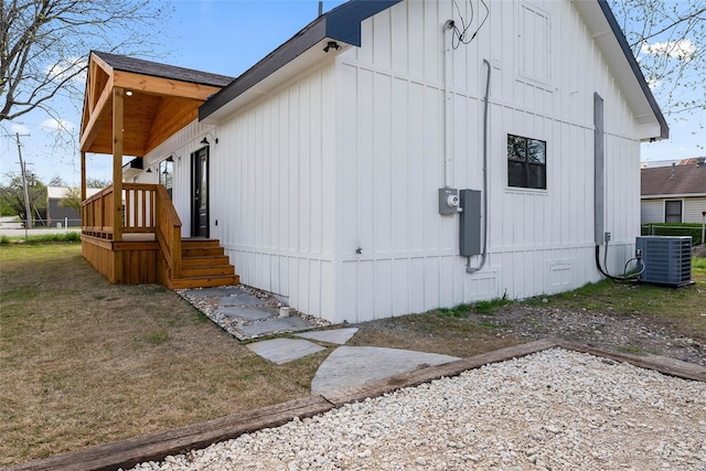 view of side of property with cooling unit