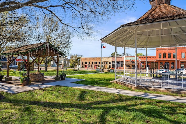 view of community with a yard and a gazebo