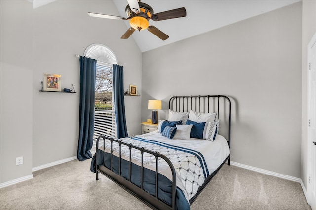 bedroom with vaulted ceiling, carpet, a ceiling fan, and baseboards