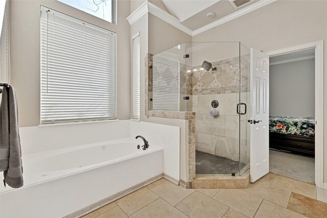 ensuite bathroom with a stall shower, ornamental molding, ensuite bathroom, a garden tub, and tile patterned flooring