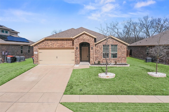 ranch-style home featuring concrete driveway, brick siding, and a shingled roof