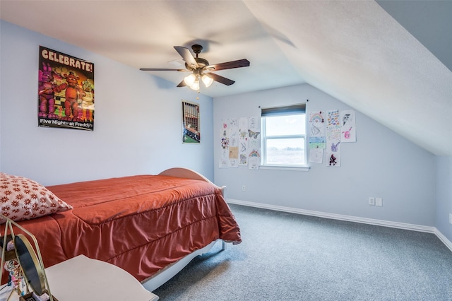 bedroom featuring vaulted ceiling, carpet flooring, and ceiling fan