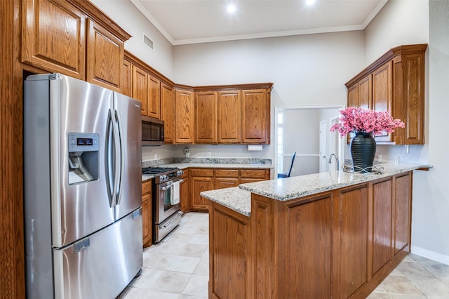 kitchen with stainless steel appliances, crown molding, light stone countertops, and kitchen peninsula