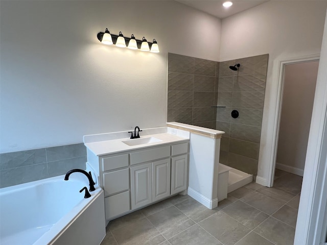 bathroom featuring tile patterned floors, separate shower and tub, and vanity