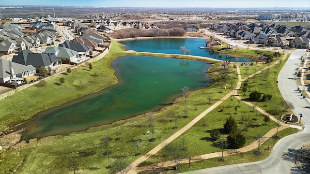 aerial view featuring a water view and a residential view