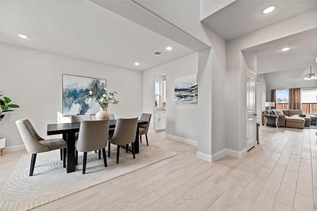 dining space featuring recessed lighting, baseboards, light wood finished floors, and visible vents