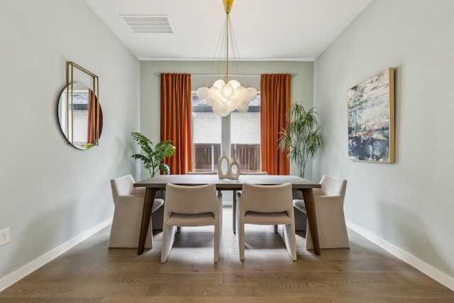 4112 Heatherton Dr, Celina, TX 75009 - dining space featuring a chandelier, baseboards, and wood finished floors