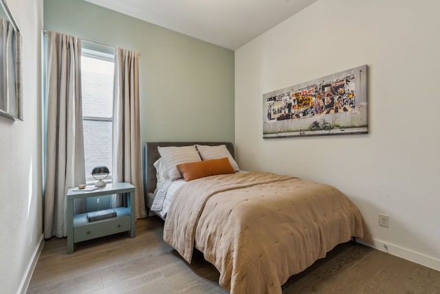 4112 Heatherton Dr, Celina, TX 75009 - bedroom featuring wood finished floors and baseboards