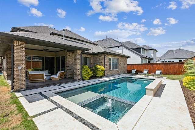 4112 Heatherton Dr, Celina, TX 75009 - view of swimming pool featuring an outdoor living space, a patio, a fenced backyard, and a pool with connected hot tub