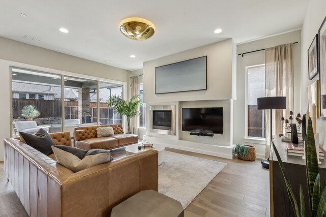 4112 Heatherton Dr, Celina, TX 75009 - living room featuring wood finished floors, recessed lighting, and baseboards