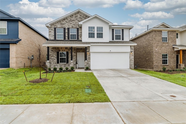 2408 Lundy Canyon St, Forney, TX 75126 - view of front of home with driveway, a garage, a front yard, and stone siding