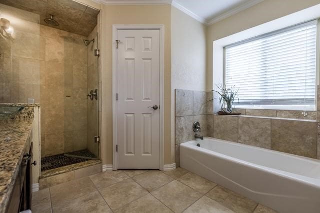 bathroom with vanity, independent shower and bath, crown molding, and tile patterned floors