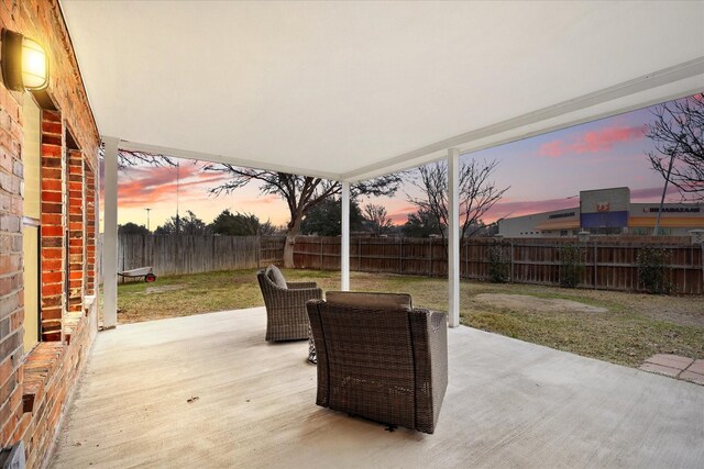 2160 Glenhaven Dr, Lewisville, TX 75067 - rear view of property with brick siding, a patio, and a fenced backyard