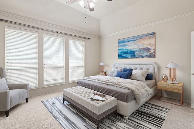 carpeted bedroom featuring ceiling fan, baseboards, and vaulted ceiling