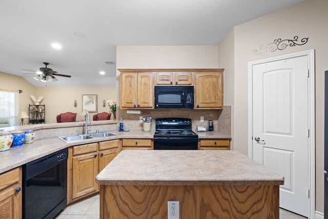 kitchen with a kitchen island, sink, tasteful backsplash, and black appliances